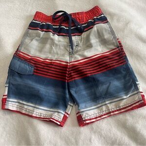 Boy’s Kanu Surf Swim Trunks. Size 7/L Flaw